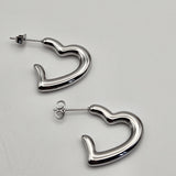 Orecchini cuore hoop argentati